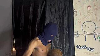 The ebony man with a huge curved dick engages in intimate activities.