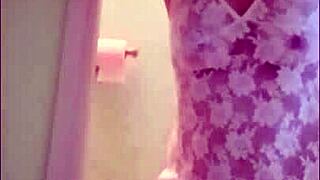 In 2025, the French maid begins her solo routine with toys and teasing in an outdoor setting.