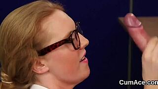 One naughty kitten eagerly gulps down a fresh load of cum on her face.