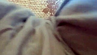 this milf is touching herself in pajamas in the bedroom