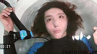 Skinny Sattira looks sexy in spandex during an underwater bathtub session