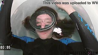Skinny Sattira looks sexy in spandex during an underwater bathtub session