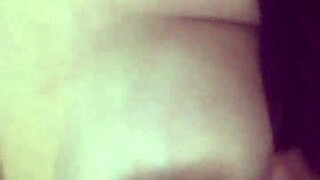 a mexican latina woman engages in her morning routine involving self-touching and her body