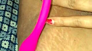 Alisha Bhabhi, the sexy Desi Indian, masturbates with a dildo in close-up