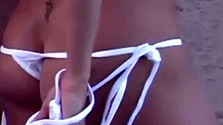 Mandy does a striptease for the camera, teasing her tits and petite body 😏📸