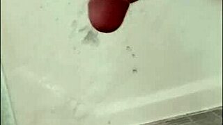 Blonde Bodybuilder Showers Muscular Cock In Bathing Scene.