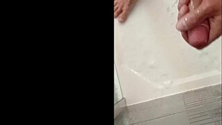 Blonde Bodybuilder Showers Muscular Cock In Bathing Scene.