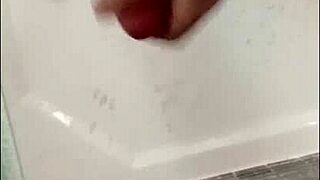 Blonde Bodybuilder Showers Muscular Cock In Bathing Scene.