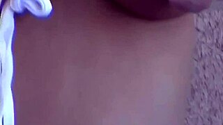 Mandy does a striptease for the camera, teasing her tits and petite body 😏📸