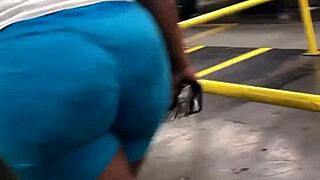 ebony thick booty walking candid in spandex leggings while spying on her ass