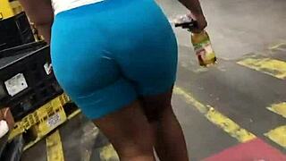 ebony thick booty walking candid in spandex leggings while spying on her ass