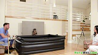 Naughty Brunette Masseuse Films Wet Nuru Massage!