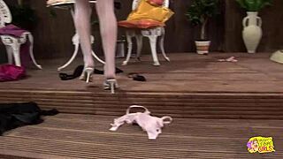 photoshoot ends with busty blonde lesbos sharing dildos