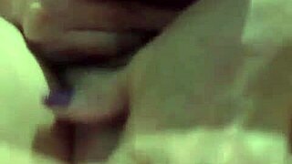 Mature woman indulging in a private intimate moment with herself, enjoying some alone time