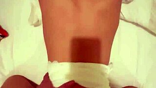 Intimate home video of Asian teen couple's shaved pussy handjob in bedroom passion