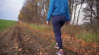 Milf's tight ass in spandex yoga pants from behind.