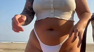 Redhead Flashes Big Swollen Pussy On Beach!