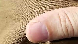 Amateur woman goes braless, nipples visible.