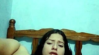 She masturbates in the bedroom until she cums.