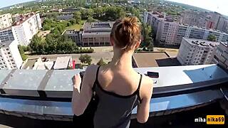 Russian bitch gets fucked hard on the roof with big cock.