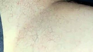 An ebony woman performs a blowjob on a big cock.