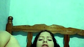 She masturbates in the bedroom until she cums.