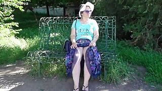 hairy mature woman in transparent dress flashing outdoors