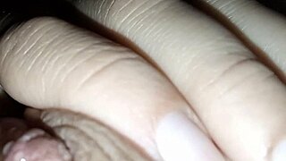 Latte flows from the nipples of a brunette with natural tits