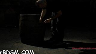 blindfolded angel competes in toy game with bound and gagged challenge.