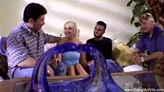 Swinger wife gets fucked in group anal session