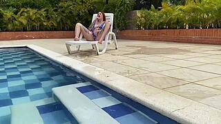 naughty redhead andy rose tastes and rides monster cock in pool