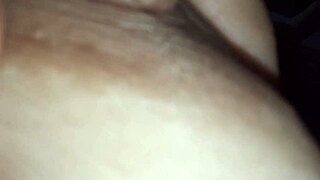 Latte flows from the nipples of a brunette with natural tits