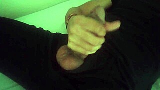 horny guy in black pants moaning and jerking off his big cock after work until he cums