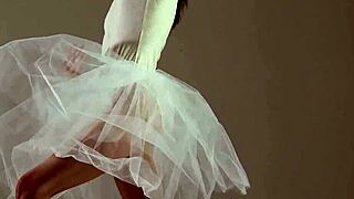 blonde gymnast performs gymnastics routine