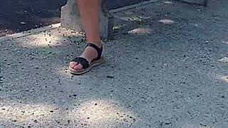 she's strolling naked on the street, flashing passersby