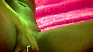 Brunette beauty feels intense pleasure masturbating to orgasm