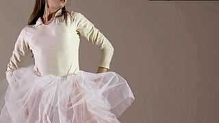 blonde gymnast performs gymnastics routine