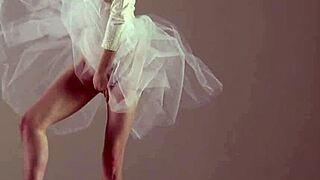 blonde gymnast performs gymnastics routine