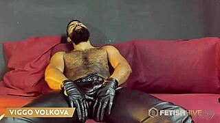 Robust hairy bodybuilder Viggo Volkova intensely masturbates with leather gloves and vibrator