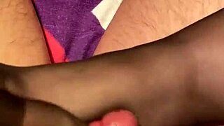 Giving The Hubby A Footjob In Black Reinforced Toe Stockings