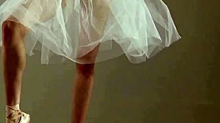 blonde gymnast performs gymnastics routine