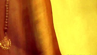 Bollywood Indian MILF dancing nude with clothes ripped and teasing.