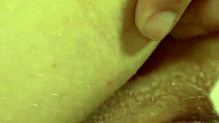 Busty Julia Ann teases her wet clit in solo play.