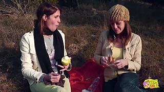 Outdoor picnic turns to lesbian strapon sex with brunette friends.
