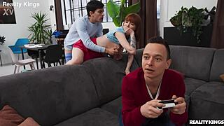 Athletic redhead with big tits bends over in reality kings gamer grind