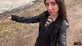 A girl has cum on her face and walks through the park to surprise onlookers.