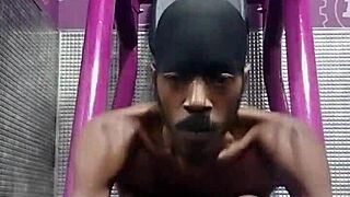 working out on the machine in the gym with my roommate