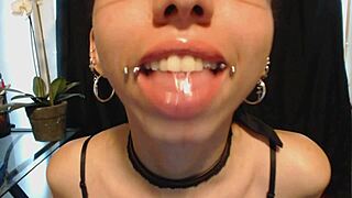 putting on nude lipstick and drooling suggestively