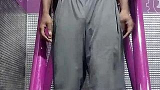 working out on the machine in the gym with my roommate