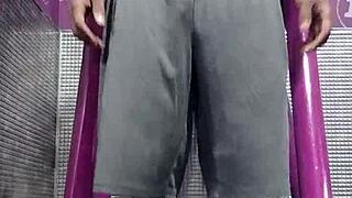 working out on the machine in the gym with my roommate